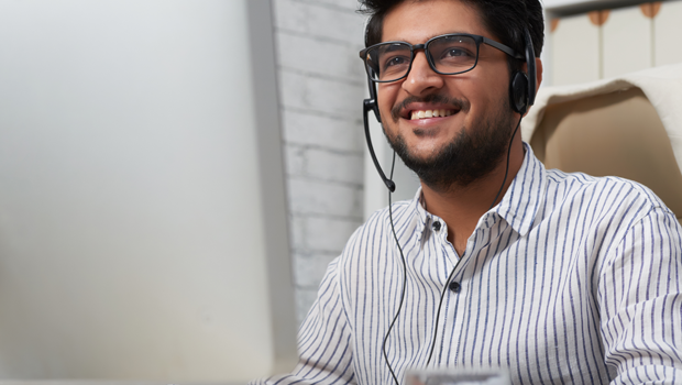 Customer service rep wearing headset.